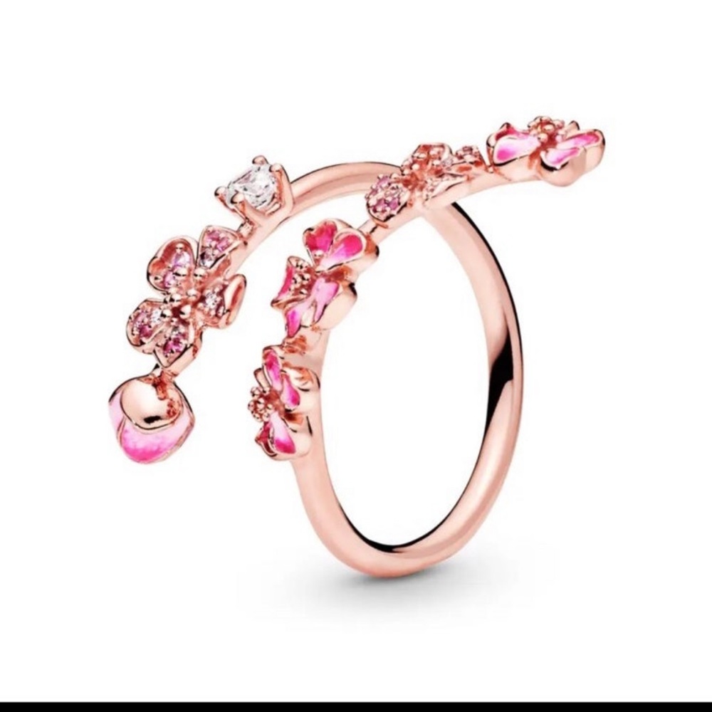 - Gold plated adjustable ring with enamel coated on flowers